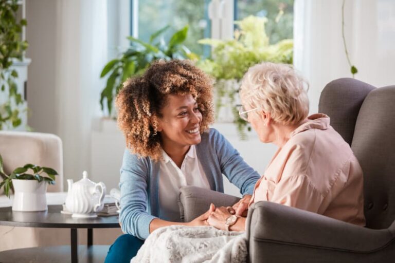 Caregiver talking with senior resident